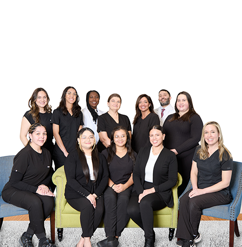 The University Dental Group team in matching black scrubs