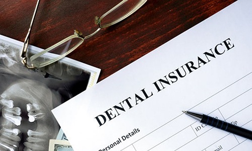 a closeup of a dental insurance form