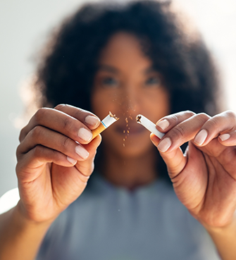 Breaing a cigarette in half