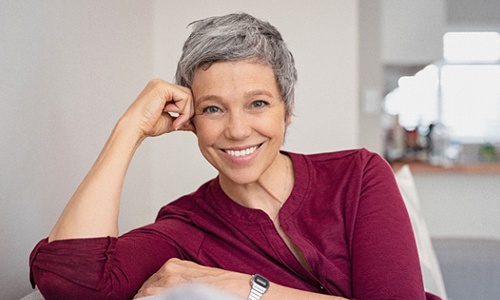 Closeup of woman with dentures in Worcester smiling