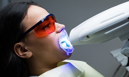 Patient receiving teeth whitening treatment