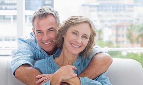 Smiling older man and woman