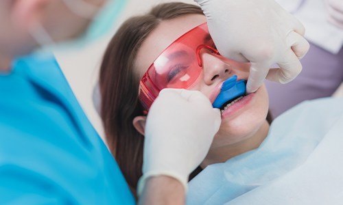 Patient receiving fluoride treatment