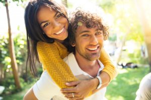 Couple smiles after using spring cleaning tips