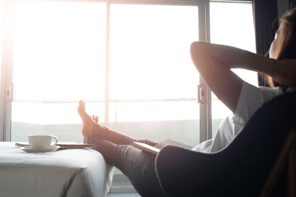 Woman relaxing during summer morning