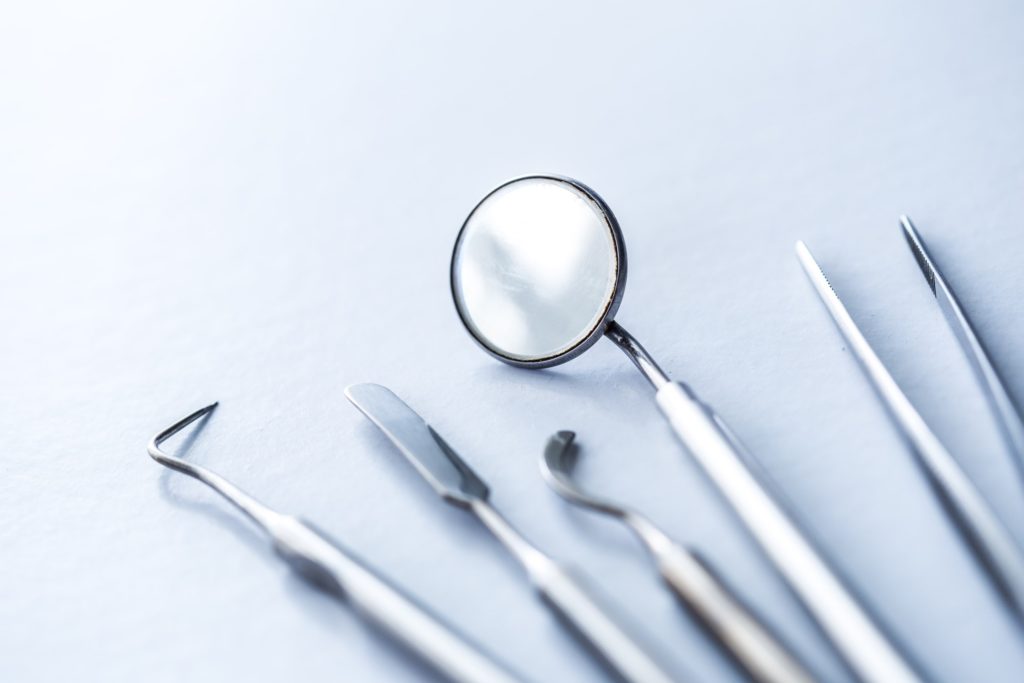 Closeup of dental instruments lying on table