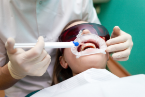 a dental patient having their teeth whitened 